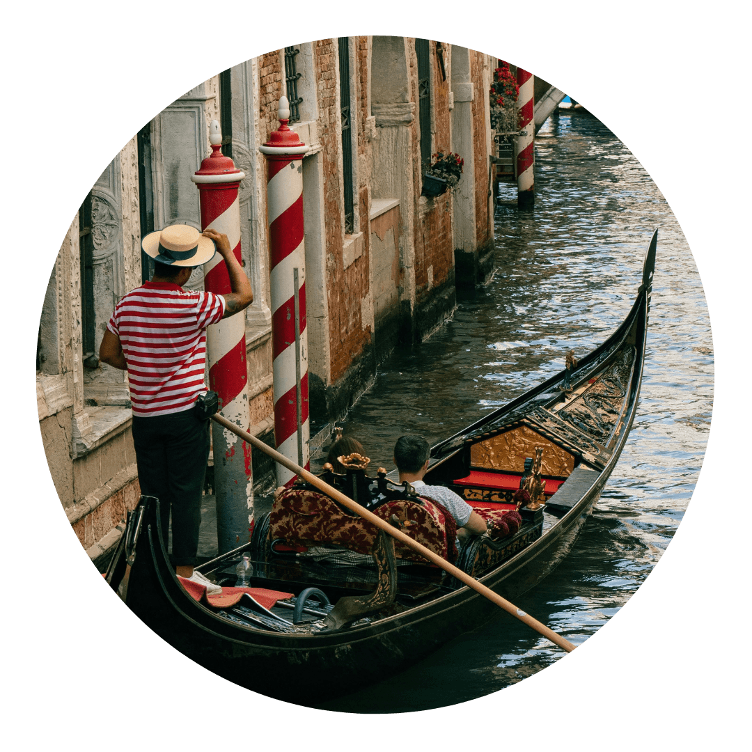 A romantic couple enjoying their honeymoon in Venice on a gondola