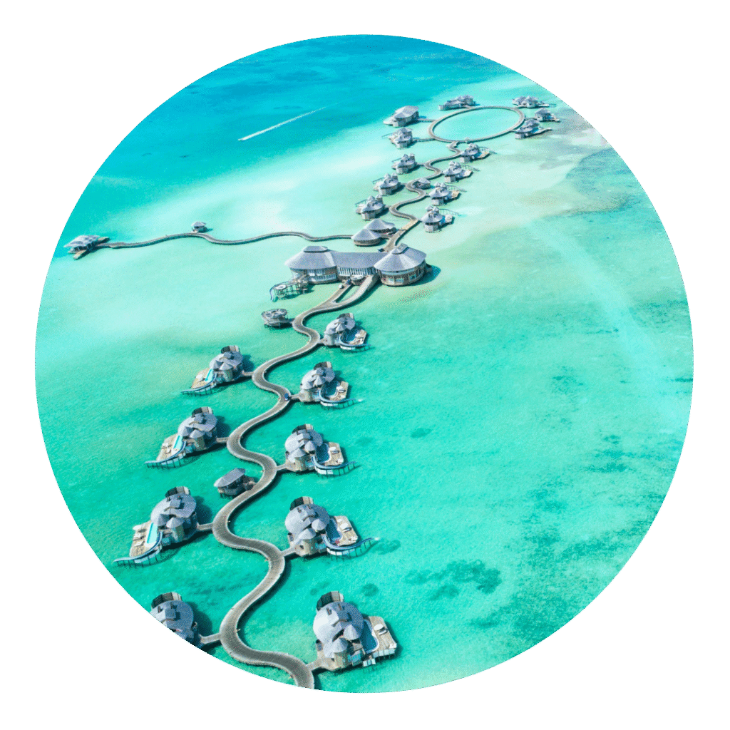 Private island escape with overwater villas and turquoise lagoon